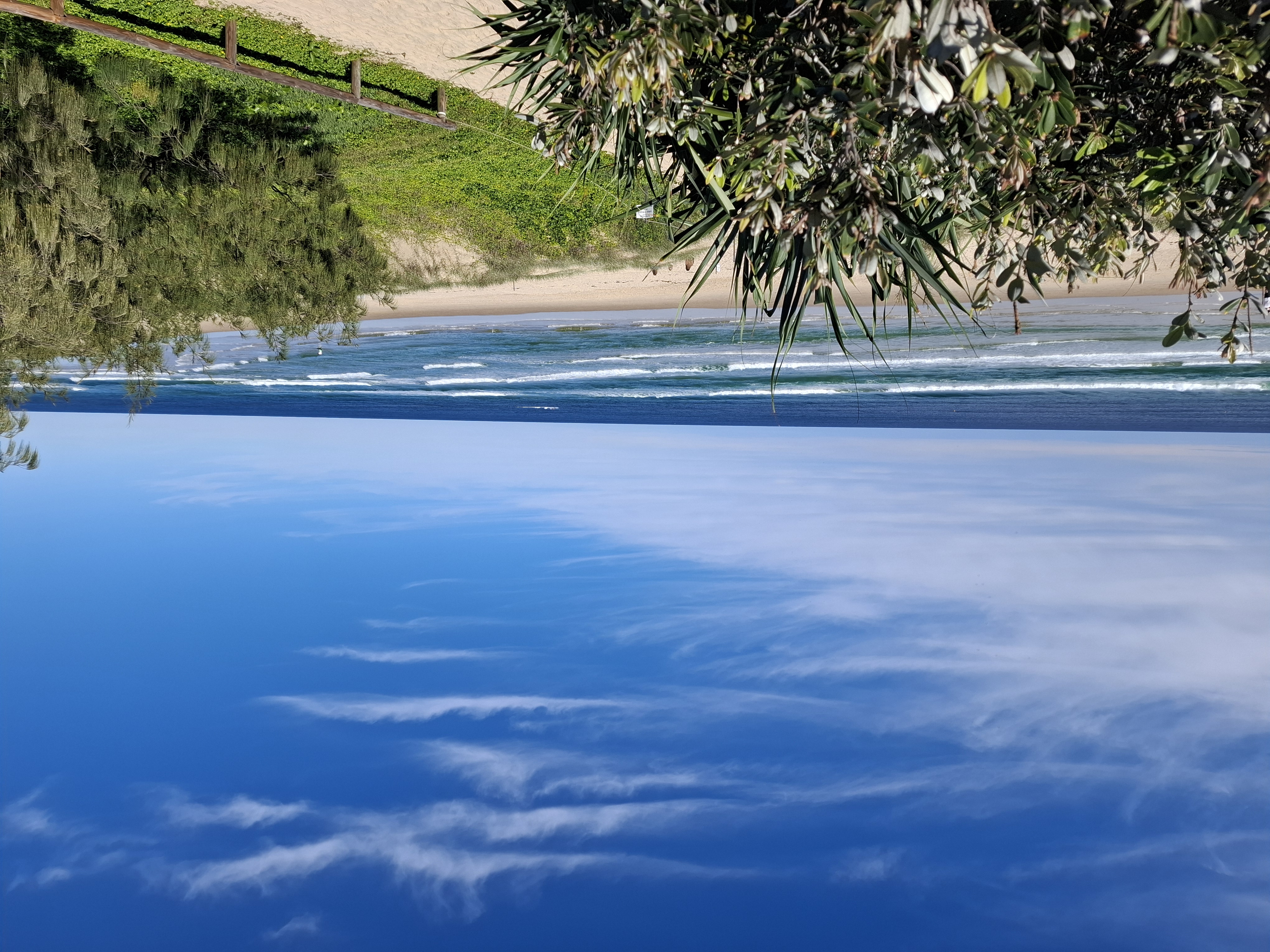 Overlooking-Peregian-Beach-waves-roll-in