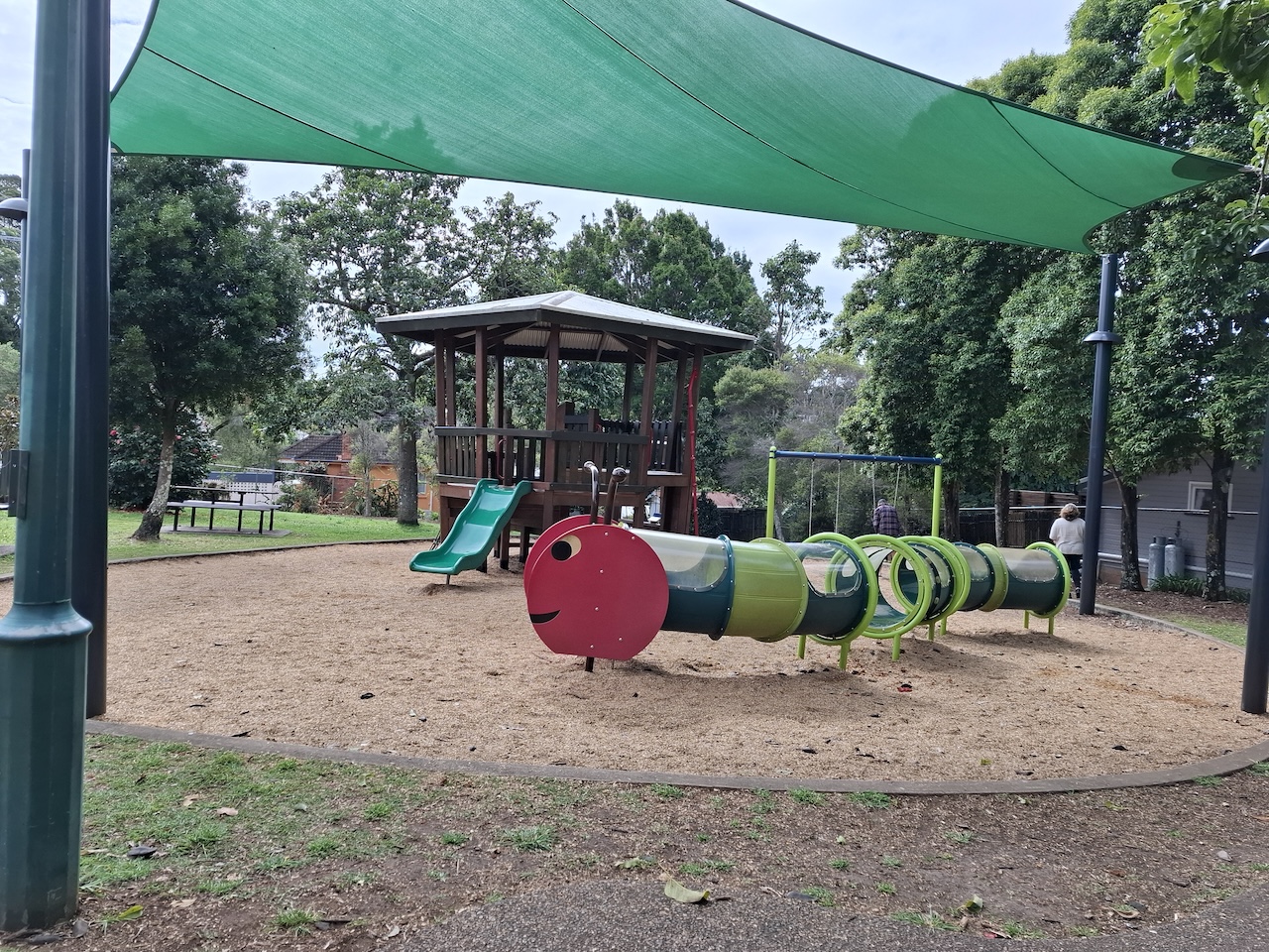 children's playground at cooke park with shade sail and slide children's playground at cooke park with shade sail and slide
