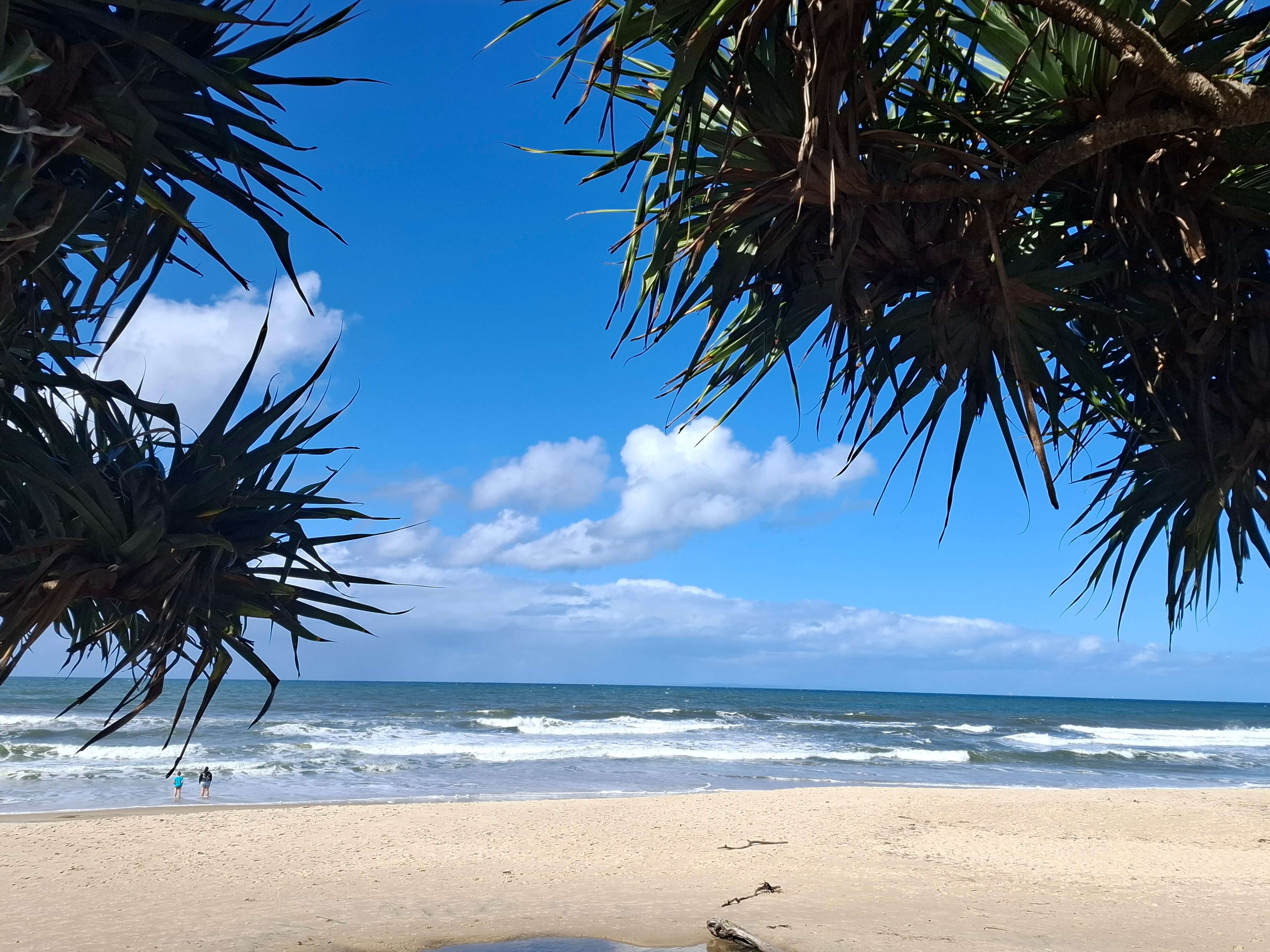 Happy Valley Beach looking back towards Caloundra and Glass House Mountains