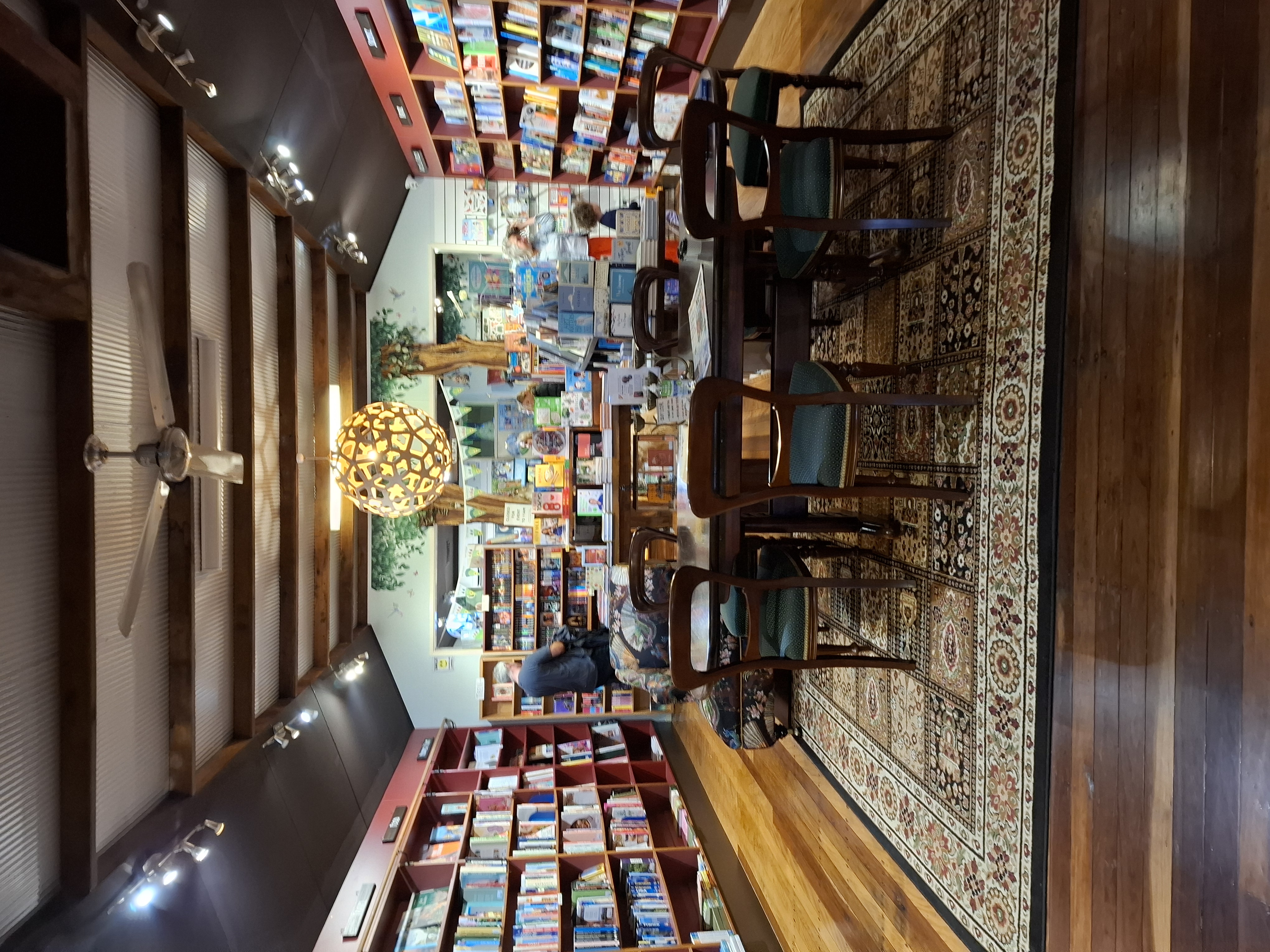 Table and chairs inside Rosetta bookshop Table and chairs inside Rosetta bookshop