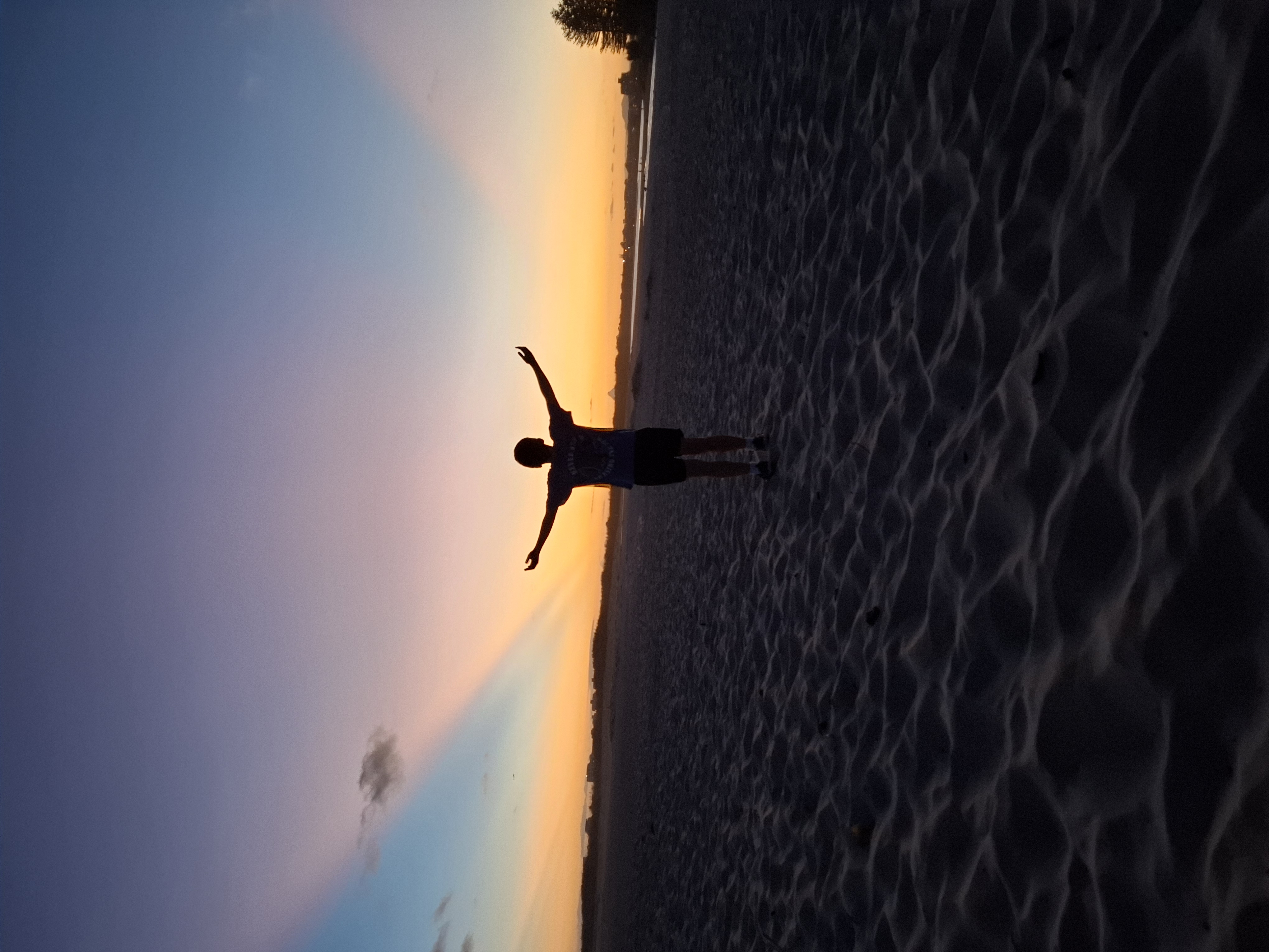 person enjoying sunset in Caloundra person enjoying sunset in Caloundra