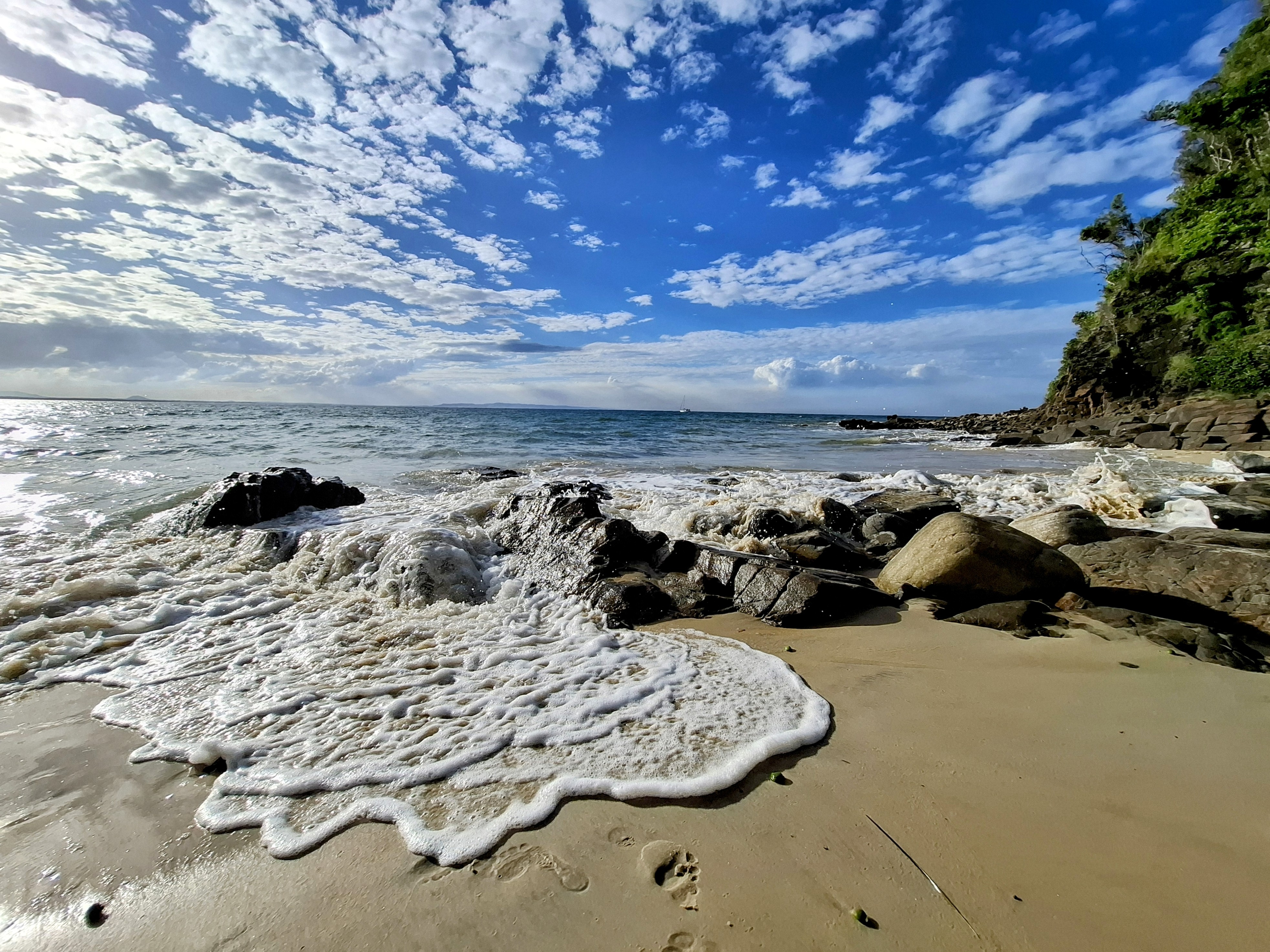 waves-hitting-rocks-beach waves-hitting-rocks-beach